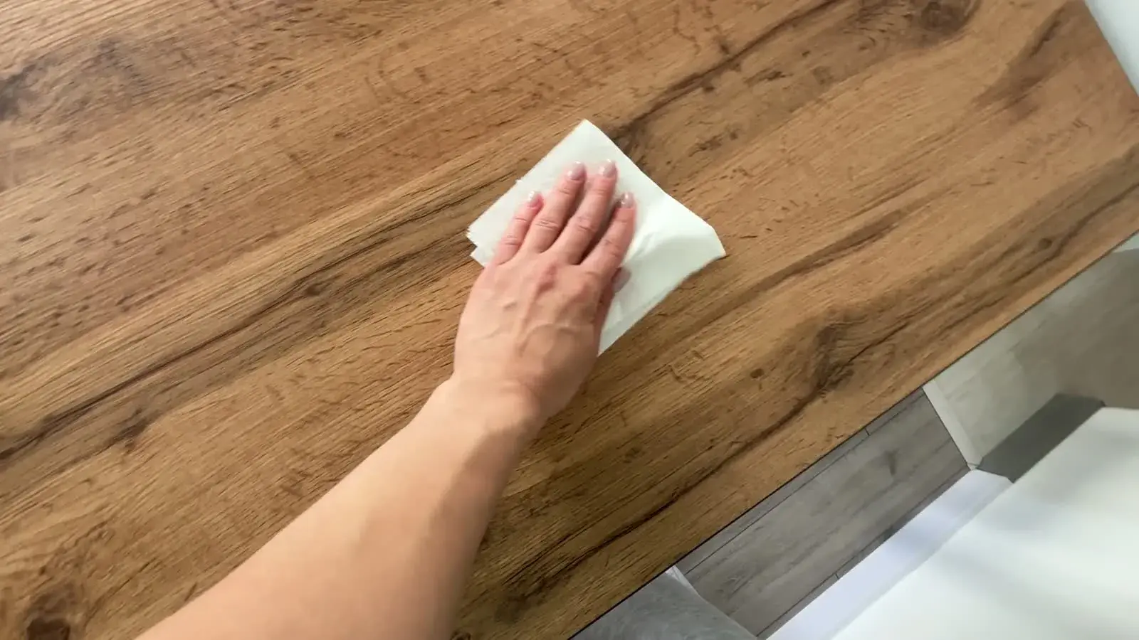 Wipe a table with a paper napkin chest-mounted preview poster