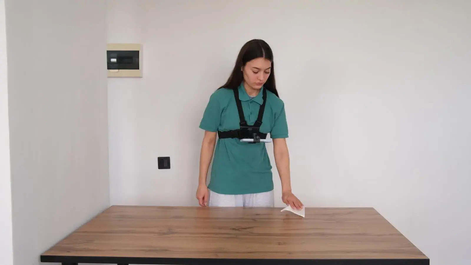 Wipe a table with a paper napkin third-person preview poster
