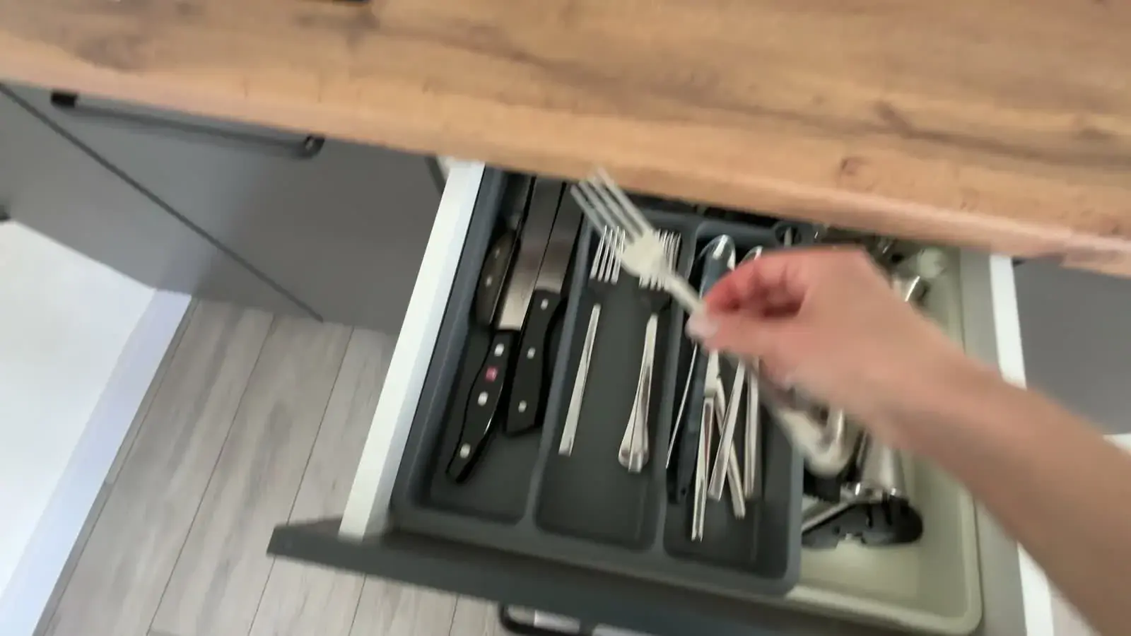 Put a fork into a drawer chest-mounted preview poster